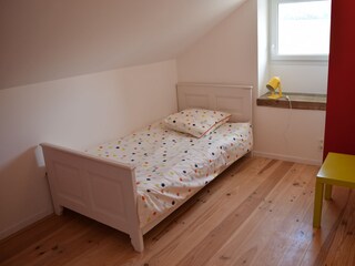 Schlafzimmer mit Doppelbett