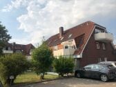 Haus vom Parkplatz aus