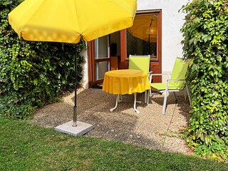 Terrace with seating and sun lounger