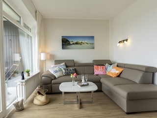 Wohnzimmer mit Schlafsofa