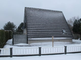 Das Ferienhaus im Winter.