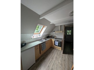 Wohnküche mit  Eingangsbereich