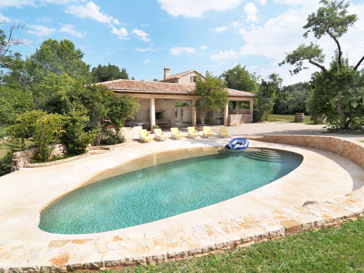 The large pool with an open terrace