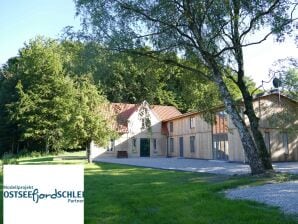 Ferienhaus Waldhaus - Kate mit Privatstrand