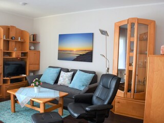 Wohnzimmer mit Schlafsofa