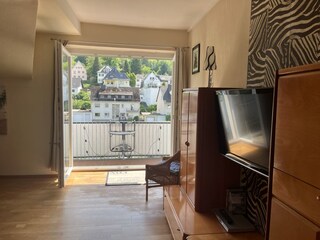 Livingroom with view to the balcony