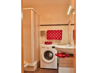 Bad mit Münzwaschmaschine