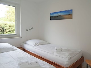 Schlafzimmer, man kann die Betten auch zusammenschieben