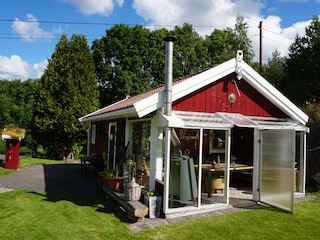 Garage mit beheizbarem Wintergarten