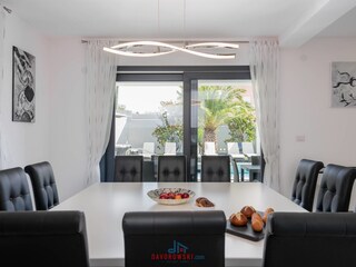 The kitchen with a large dining table