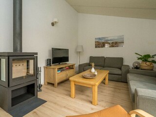 Die komfortable Sitzecke mit Kaminofen