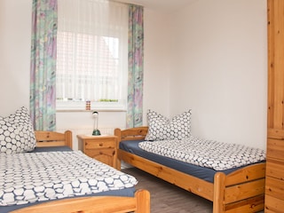 Schlafzimmer mit Einzelbetten