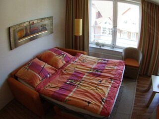 ausgeklapptes Schlafsofa