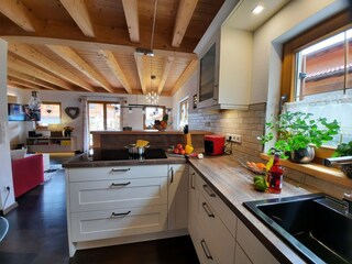 Open kitchen with an induction ceramic hob