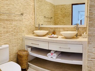 Private bathroom with shower.