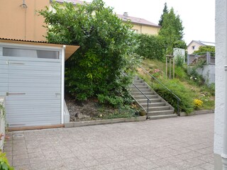 View from the terrace to the garden shed