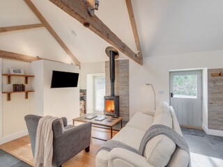 Gemütliche Sitzecke mit Holzofen