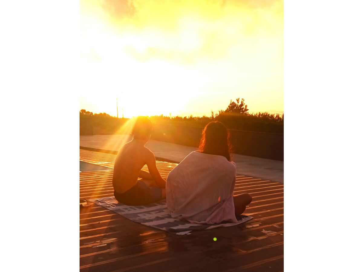 sunset by the pool