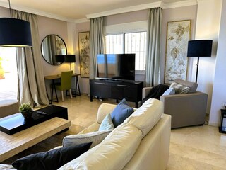 sytlish lounge area with 40"-LED-SMART-TV