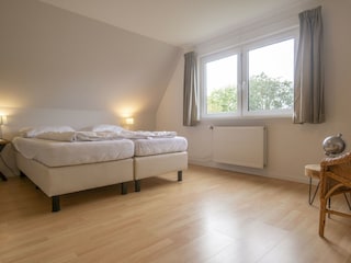 3. Schlafzimmer mit Doppelbett im Obergeschoss