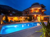 Night view of the villa and outside area