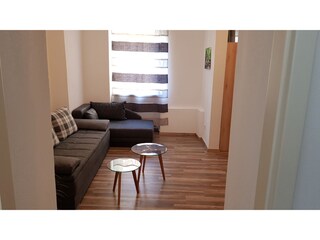 Wohnzimmer mit 2 Schlafsofas