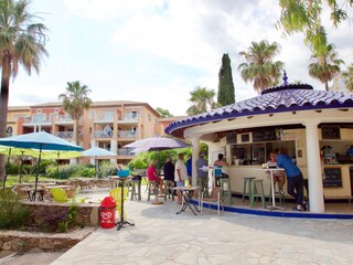 at the pool there is a snack restaurant