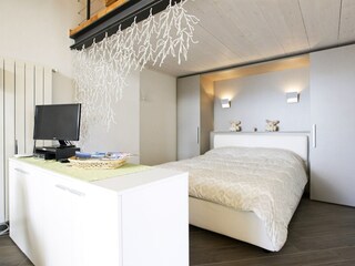 Schlafnische mit Doppelbett