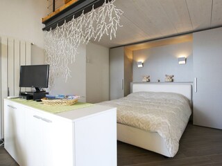 Schlafnische mit Doppelbett