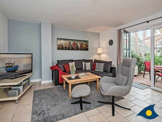 Wohnzimmer mit Zugang zur Terrasse
