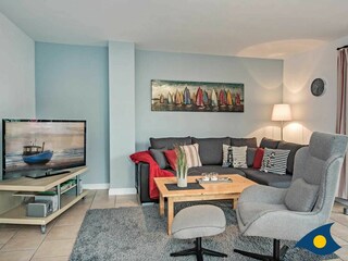 Wohnzimmer mit Zugang zur Terrasse
