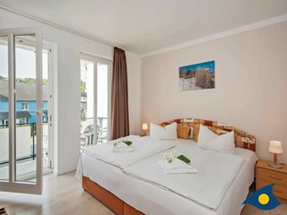 Schlafzimmer mit Doppelbett