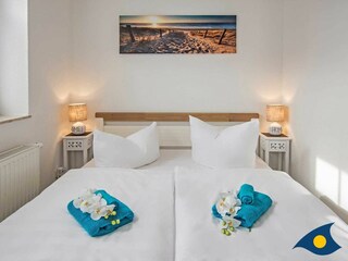 Schlafbereich mit Doppelbett