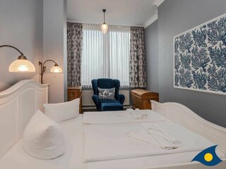 Schlafzimmer mit Doppelbett