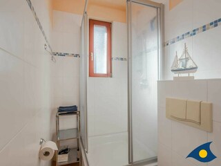 Badezimmer mit Doppelbett