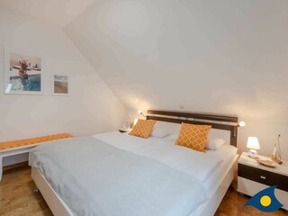 Schlafbereich mit Doppelbett