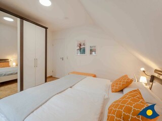 Schlafbereich mit Doppelbett