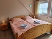 Schlafzimmer mit Doppelbett