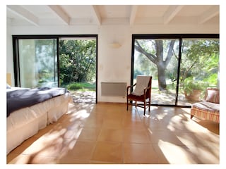 Masterbedroom with doors to terrace / garden