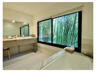 first bathroom with shower and bathtub