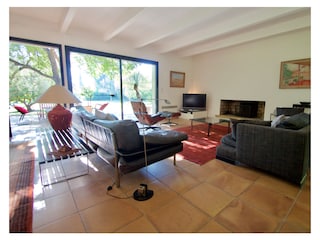 Large living with glass doors over the full length
