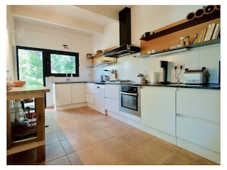 the kitchen is fully equipped