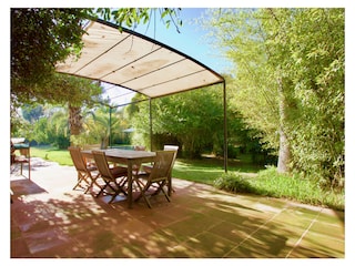 Die Speiseterrasse / Veranda mit Grill