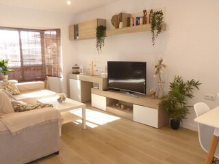 TV and dining table (on the right in the pic)