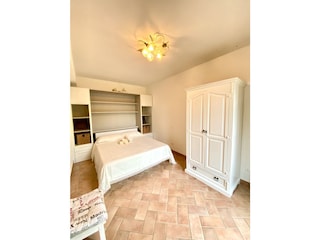 Villa Castagneto Carducci Schlafzimmer 26