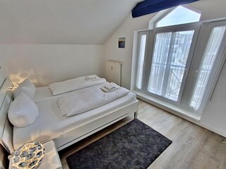 Schlafzimmer mit zusätzlichem Flachbild-TV