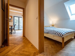 View into living room and bedroom on the first floor
