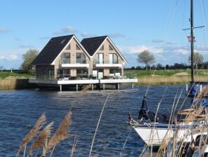 Ferienhaus Perle am Yachthafen Pfahlhaus Harlesiel - Carolinensiel - image1