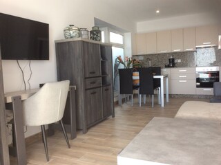 Wohnzimmer mit Kueche