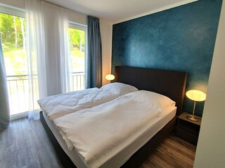 Schlafzimmer mit Doppelbett